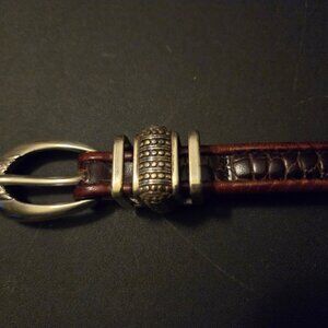 Dark brown leather belt with beautiful hardware.
